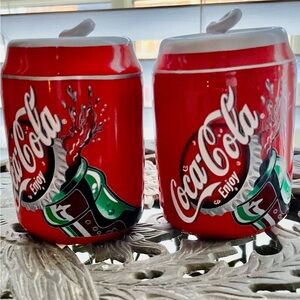 New, Early 2000, Coca-Cola ceramic Salt and Pepper Shakers with stoppers.